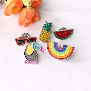 Set of 5 colorful enamel pins featuring pineapple watermelon and rainbow designs