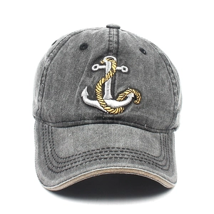 Detail of vintage washed gray baseball cap featuring premium 3D anchor embroidery textures