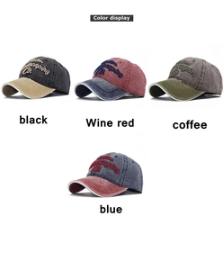 Detail showing vintage washed cotton baseball caps with 3D Boston Landscaping embroidery