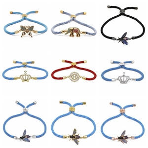 Detailed grid of woven rope bracelets with micro-set zircon animal and crown pendants