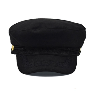 Vintage wool baker boy hat in black with gold buttons and embroidered brim detail