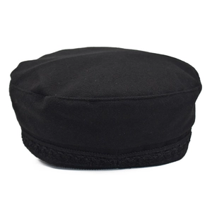 Classic black wool baker boy hat with braided trim detail on a white background