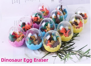 Macro detail of dinosaur egg erasers with colorful miniature dinosaur figurines inside