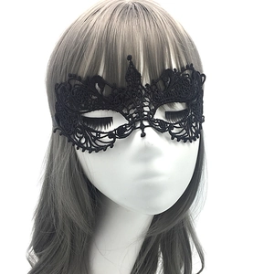 Close-up of black lace masquerade eye mask on a mannequin for adult party events