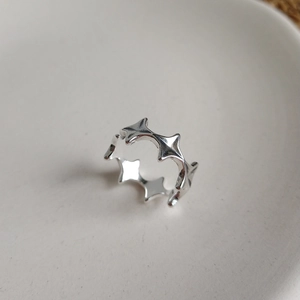 Minimalist 925 sterling silver ring with irregular star pattern and vintage finish