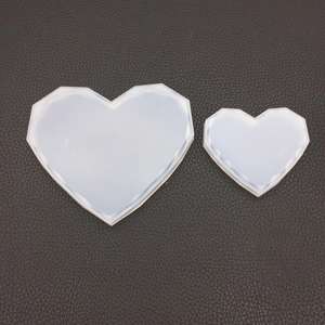 Detailed view of two-piece heart-shaped geometric silicone molds for DIY resin crafts
