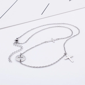 Silver stainless steel necklace with multiple cross pendants and lobster clasp fastener