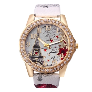 Women's quartz watch with Eiffel Tower pattern, gold rhinestone case and white leather strap
