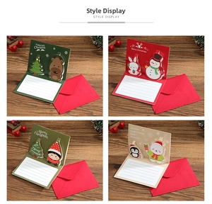 Detailed view of four 3D Christmas pop-up greeting cards with cute cartoon patterns