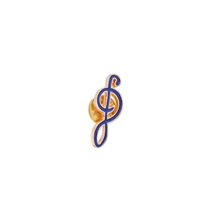Close-up of golden treble clef enamel pin with blue filling and butterfly clutch back