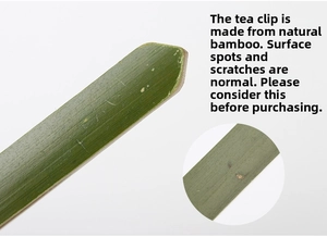Macro view of natural bamboo tea tongs showing the organic green skin and grain texture