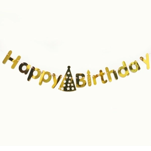 Close-up of golden Happy Birthday banner with mirrored finish and birthday hat decor