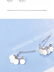 Detailed view of S925 sterling silver hoop earrings with dangling polished round sequins