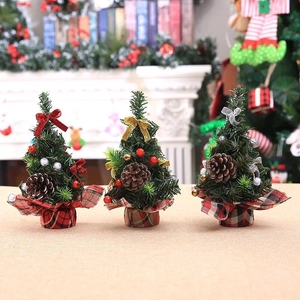 Three 20cm mini Christmas trees with pine cones, berries and checkered fabric bases