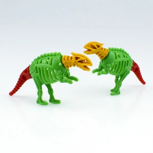 Detail of colorful plastic dinosaur skeleton DIY assembly toy with realistic bone texture
