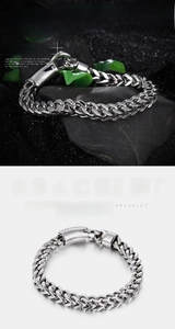 Detail of titanium steel men's wheat chain bracelet with a heavy mechanical clasp