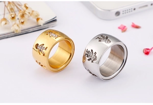 Polished titanium steel rings with hollow boy and girl cutout designs in gold and silver