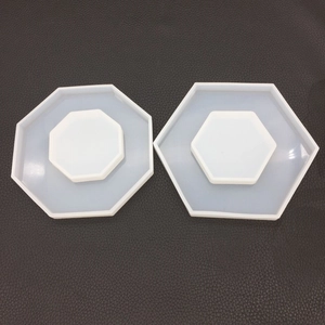 Macro view of hexagonal and octagonal translucent silicone molds for DIY resin casting