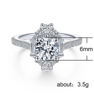Anello halo di lusso con zircone da 6mm e pietre baguette in metallo bianco