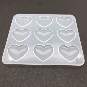 Top view of a 9-cavity heart silicone mold for DIY resin crafts and soap making