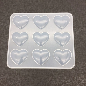 Macro view of flexible 9-cavity heart silicone mold for resin casting and DIY crafts