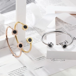 Classic Roman numeral bangle set in rose gold, gold and silver stainless steel
