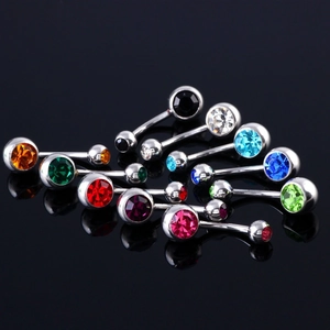 Polished stainless steel navel rings with colorful faceted gems in a curved barbell design