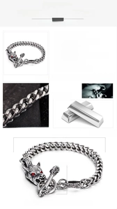 Détail du bracelet en acier avec fermoir tête de loup et yeux en pierres rouges