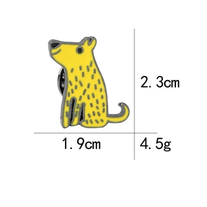 Cute yellow dog enamel pin detail view, stylish metal lapel badge for bags and clothes.