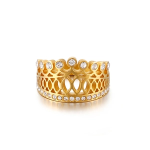 Elegant gold crown ring in titanium steel with sparkling cubic zirconia on white background