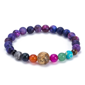 Detailed view of the solar system bracelet featuring natural stones and colorful planetary beads