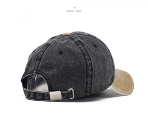 Detail view of the vintage washed cotton baseball cap with adjustable metal buckle back