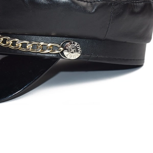 Women black PU leather baker boy cap with gold chain and metal buckle detail
