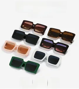 Flat lay of colorful square frame retro sunglasses with thick temples in various stylish colors