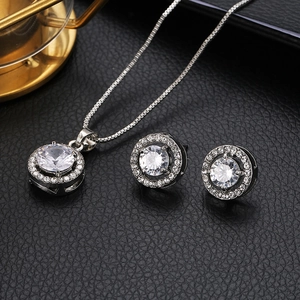 Silver halo jewelry set with round clear cubic zirconia necklace and stud earrings