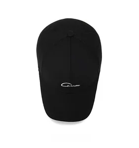 Top view of a black baseball cap with white linear embroidery and 6-panel detail