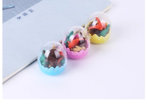 Detailed view of colorful dinosaur egg erasers in blue pink and yellow colors