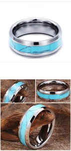 Macro detail of tungsten ring with turquoise inlay and polished beveled edges
