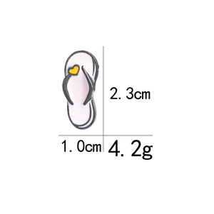 Pink cartoon flip-flop enamel pin brooch with heart detail and 2.3cm height measurement