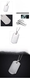 Detail view of silver stainless steel dog tag pendant with 35x18mm size and bead chain