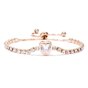 Elegant gold adjustable bracelet with sparkling heart charm and cubic zirconia inlay