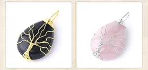 Detail of tree of life wire-wrapped water-drop crystal pendants in gold and silver finish