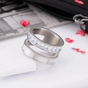 Double-layer silver stainless steel ring featuring a zircon band and polished finish