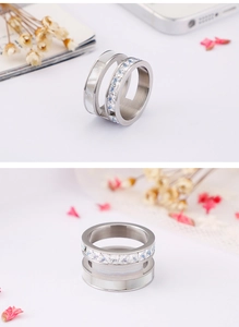 Detailed macro view of silver double-layer openwork ring with square white zircon stone