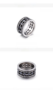 Macro shot of 12mm stainless steel ring with blue and white zircon geometric inlay detail