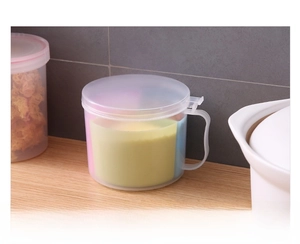 Kitchen seasoning box detail showing ergonomic handle and three-compartment organizer