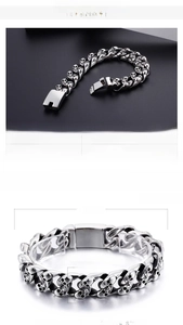 Detailed view of titanium steel skull link bracelet for men with secure square clasp