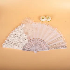 White lace folding fan with soft feathers and pearl accents for wedding or dance