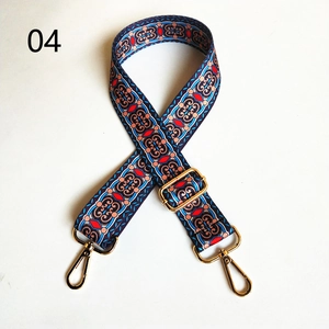 Adjustable wide bohemian strap with tribal geometric patterns and gold metal lobster hooks