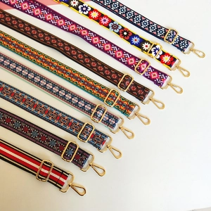 Detailed view of nine bohemian style adjustable replacement shoulder straps with gold hooks